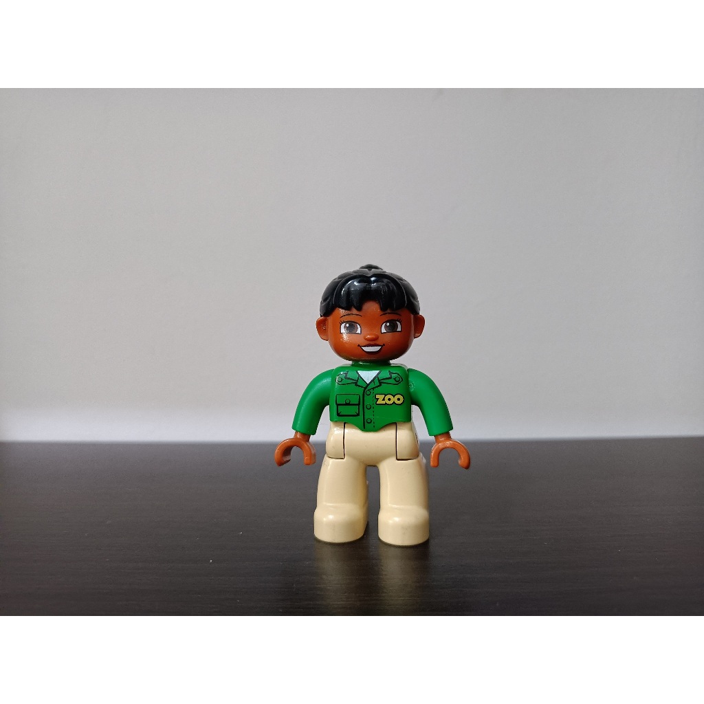 Lego Duplo Figure Lego Ville, Female, Tan Legs, Green Top with 'ZOO' on Front and Back, Black Ponyta