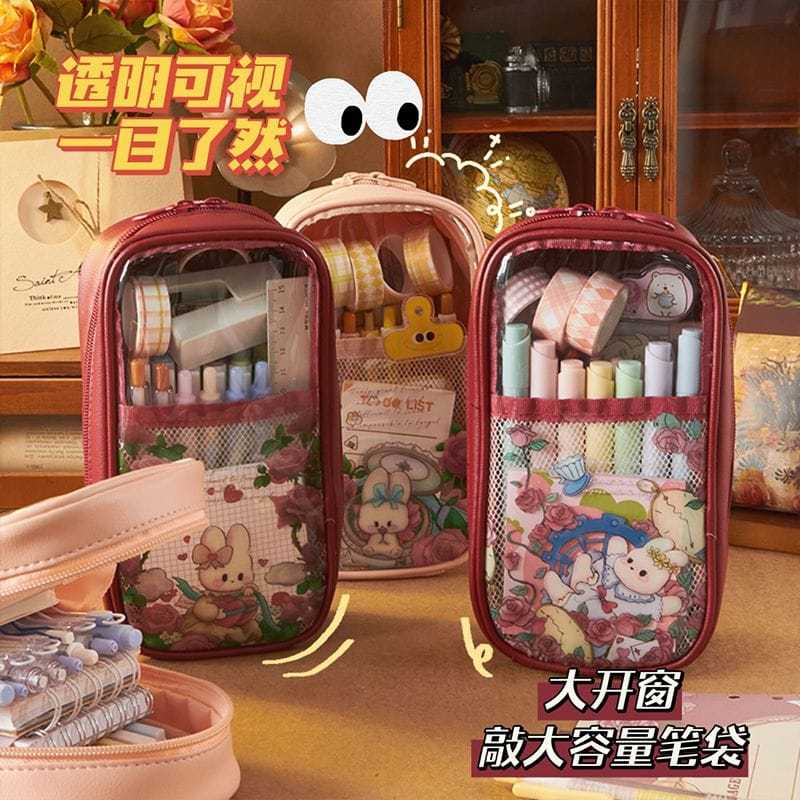 

Tempat pensil transparan buka atas dengan kapasitas besar warna dan gambar lucu