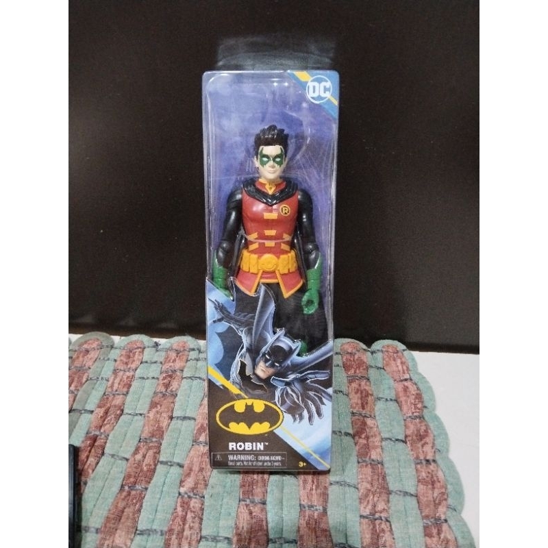 robin dc figure lengan hijau