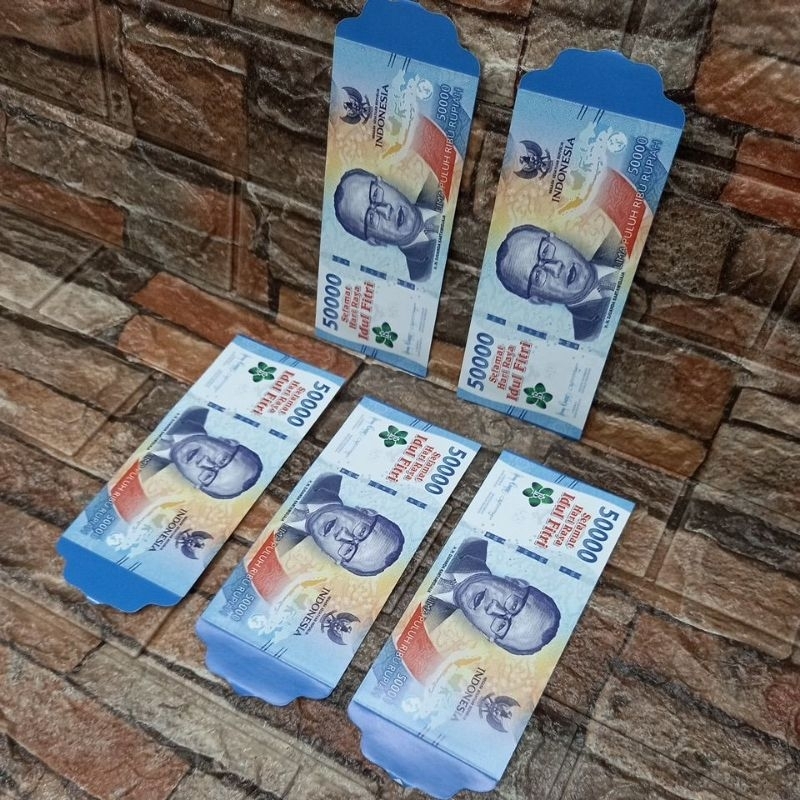 

10 lembar ampau lebaran 7.5 cm x 16 cm ( uang mainan 50k )