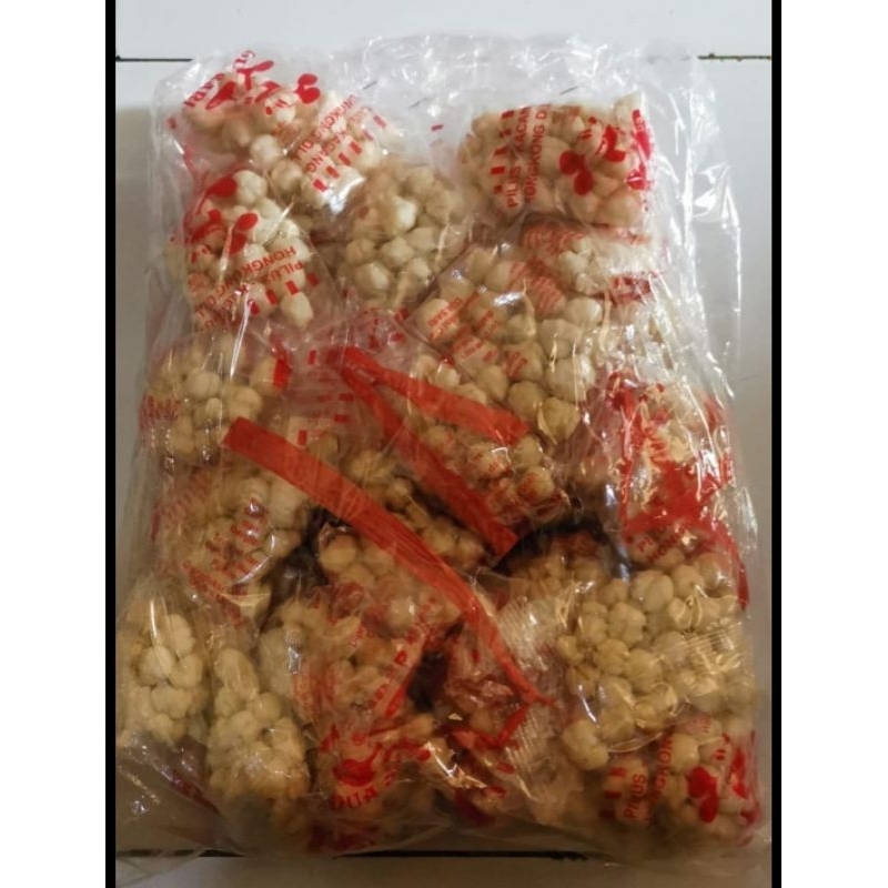 

pilus cikur/kencur 1 pack 50 bks murah meriah enak cemilan jadul cocok untuk toping baso aci, seblak, mie instan, baso dll