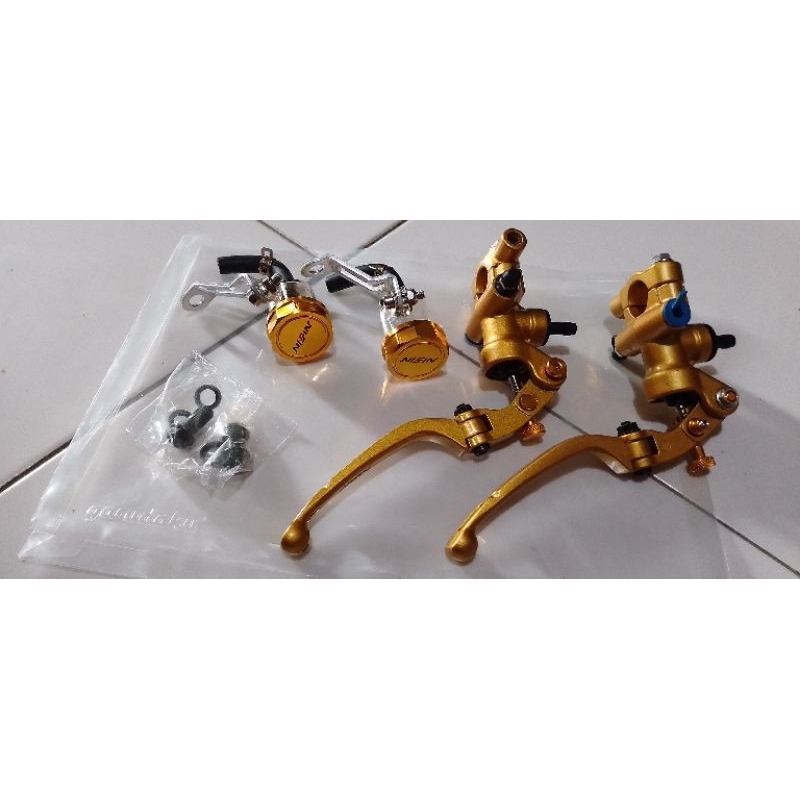 Master rem nissin full gold 2 tabung untuk nmax pcx xmax belum termasuk kabel.