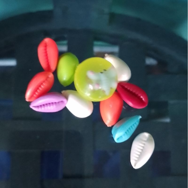 MAINAN BOLA BEKEL KERANG KUWUK PLASTIK