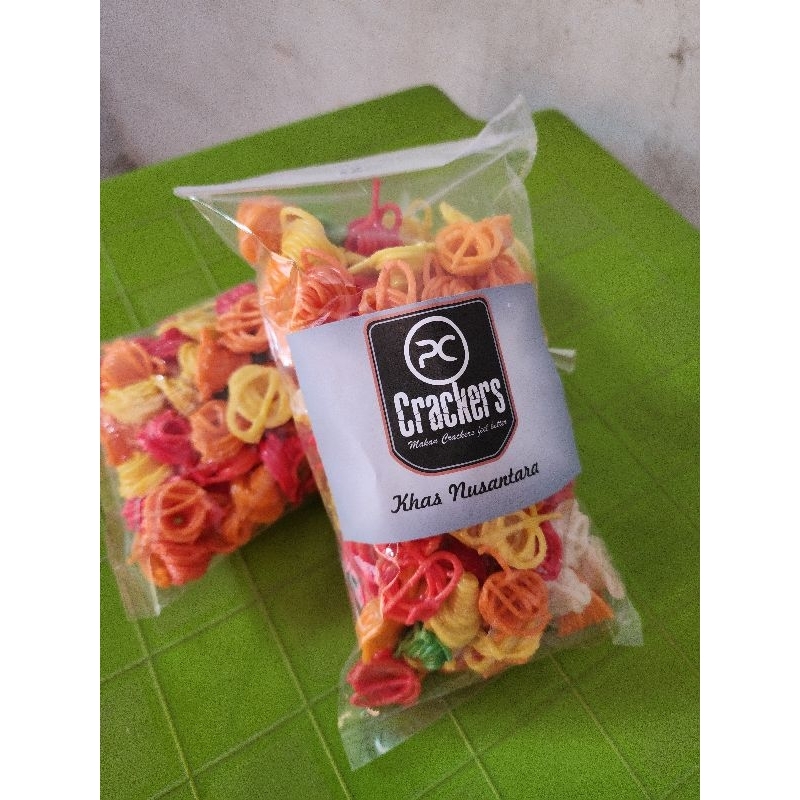 

Kerupuk Mentah Keong Warna (Amoi) Kemasan 250 Gram