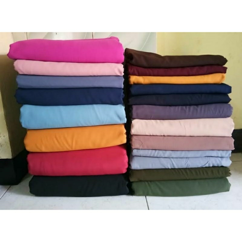 Kain Wolfis Polos Kiloan