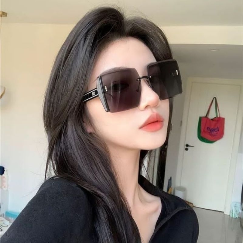 Kacamata fashion wanita oversized tanpa bingkai anti UV 400