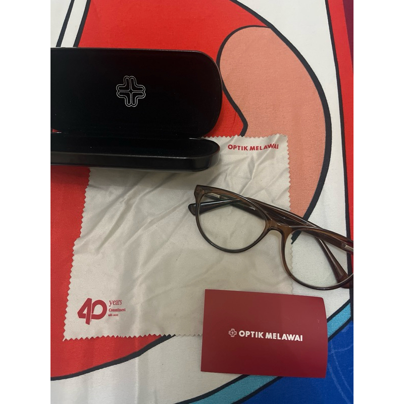 kacamata optik melawai