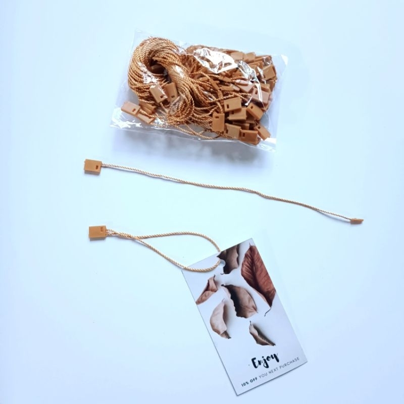 

Tali hang tag /tali tag / tali nylon COKELAT (+- 100pcs)