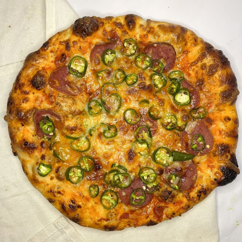 

Jalapeno Honey Pizza (sourdough pizza beefpepperoni, jalapeno & honey)