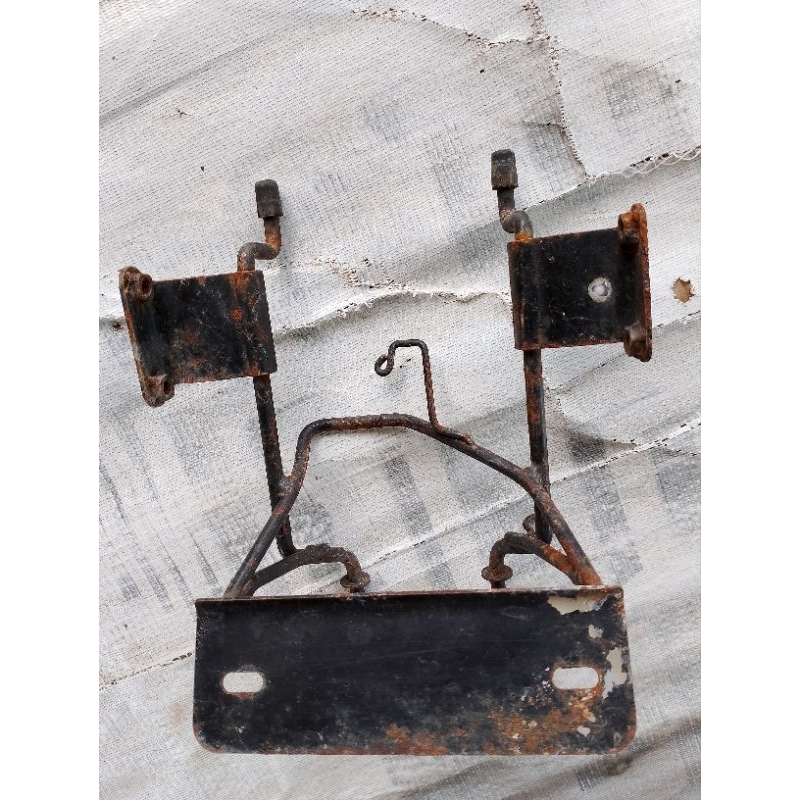 pangkon braket lampu depan megapro primus ori