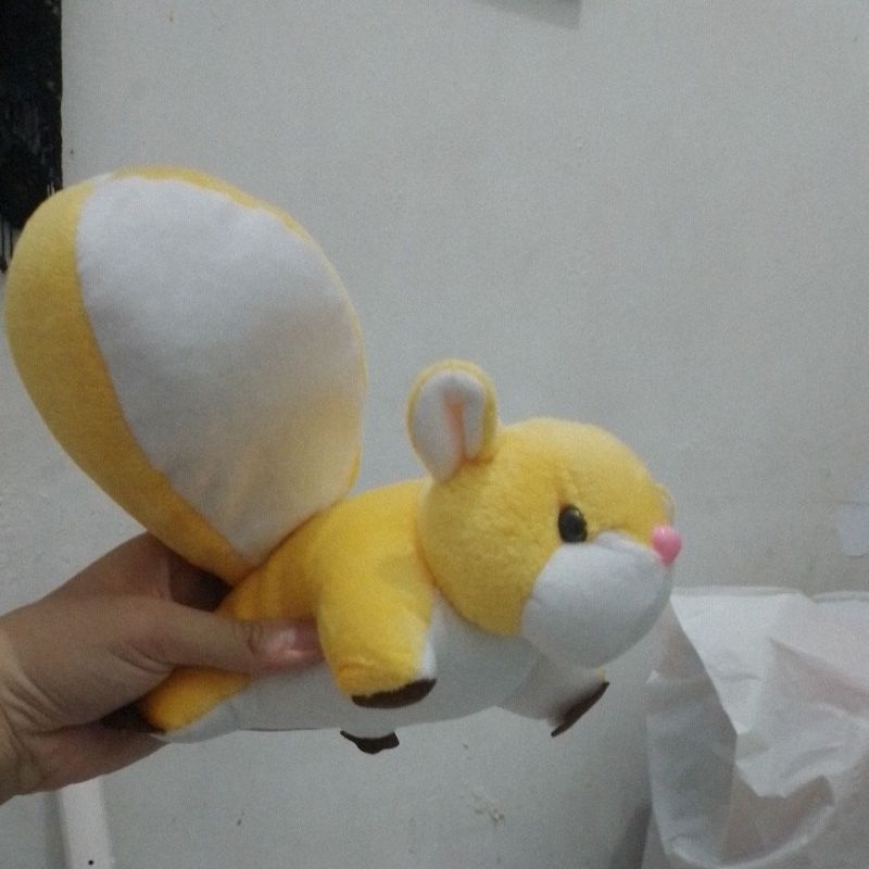 boneka kuning musang