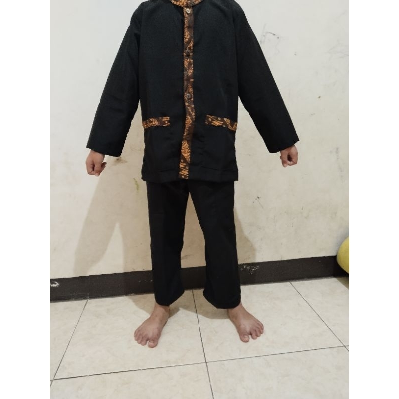 stellan pangsi anak batik adat sunda.