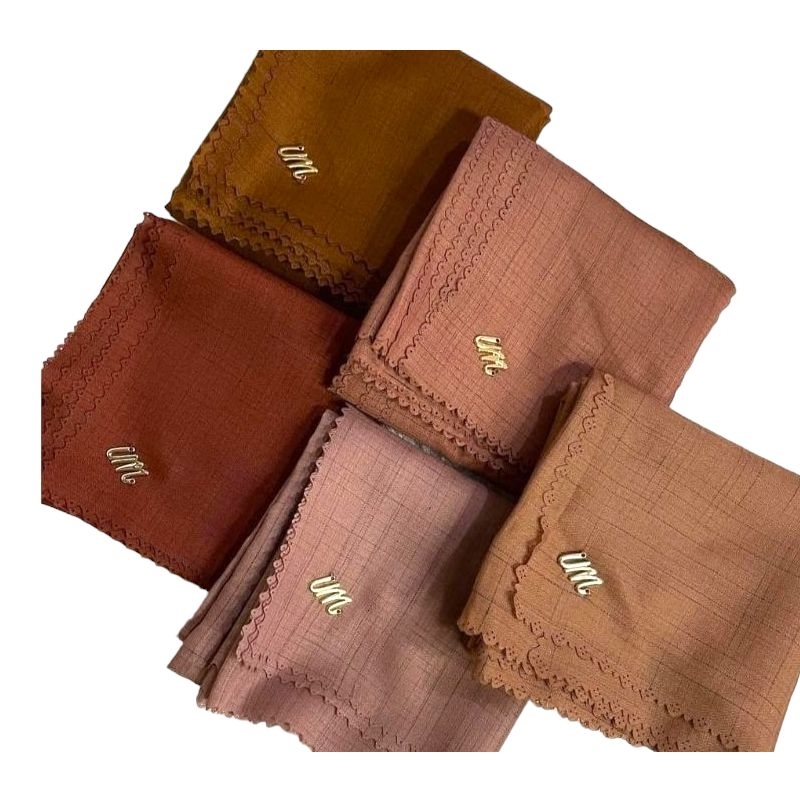 HIJAB SEGI EMPAT UMAMA VOAL WAFFLE LC METAL LOGO