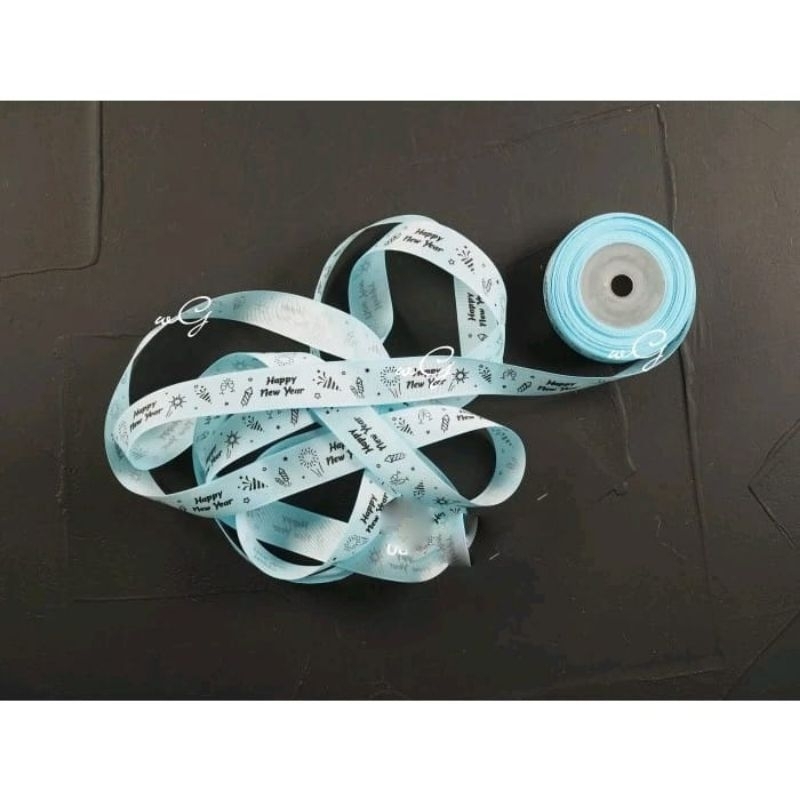 

Pita Happy New Year - Baby Blue ;Lebar 2.5 cm ;Panjang 20 yard