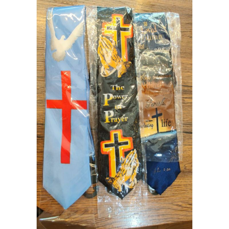 Dasi Rohani tempel motif salib