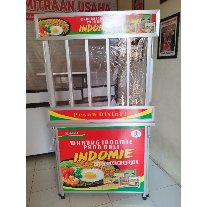 Booth Portable Meja Lipat Rombong Warmindo ukuran 100x60 dengan tempat display Indomie