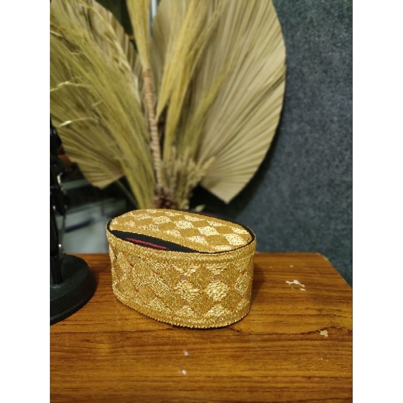 peci tapis mata kibau