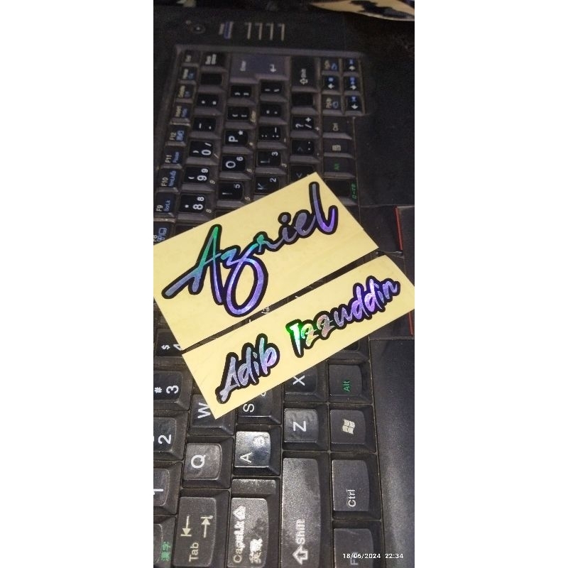 

CUTTING STICKER CUSTOME NAMA 2 LAYER MURAH