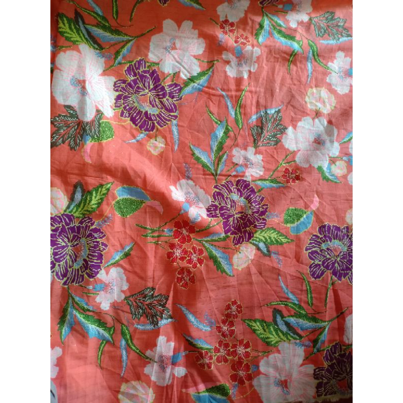 KAIN KATUN MOTIF BUNGA ORANGE TIPIS (REQ PANJANG 50 CM = Rp14.500)