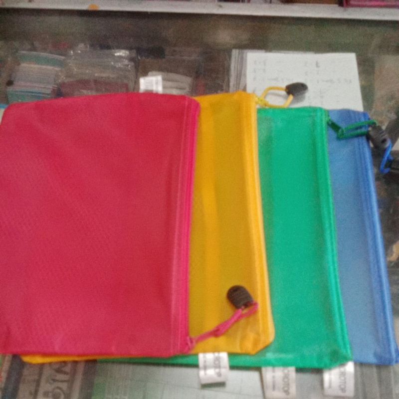 

POCKET FILE/ZIPPER/TEPAK PENSIL RESLETING BUTEK UKURAN A5