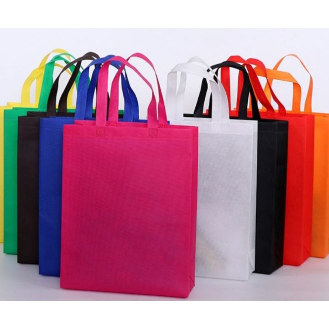 

FG2 12 pcs Tote Goodie Bag Spunbond tali handle Tas souvenirpromosiultahhajatanlebaranhampers Ready Banyak Warna dan Ukuran Lebar Samping 8 cm
