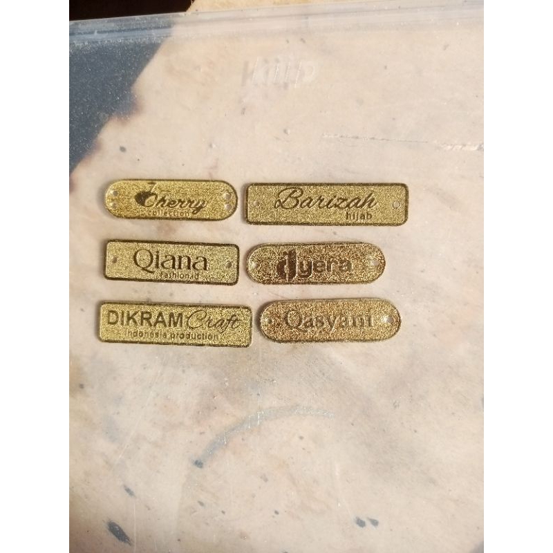 

label plate fashion model kulit jeruk, terbuat dari bahan Kuningan