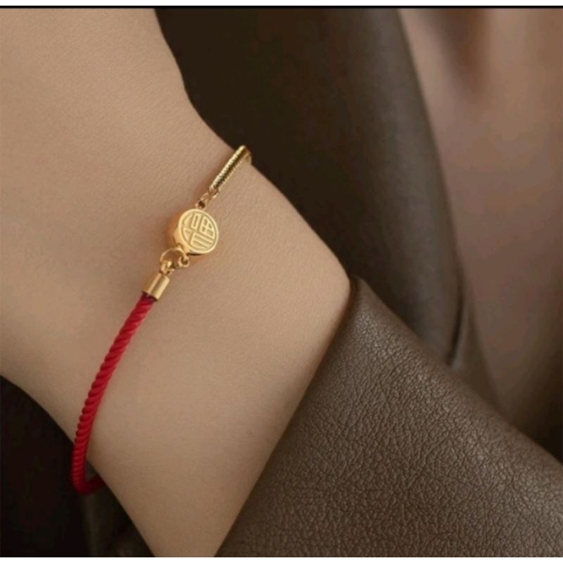 Gelang titanium tali merah bulat cina