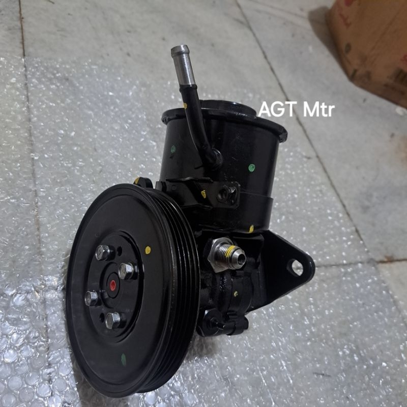 pompa power steering ford laser.