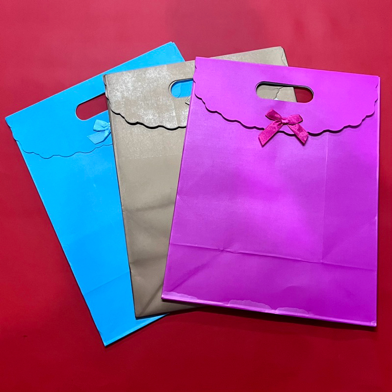

Paper bag premium Tas Kado jumbo besar polos lucu perekat pita Ecofootwear.id
