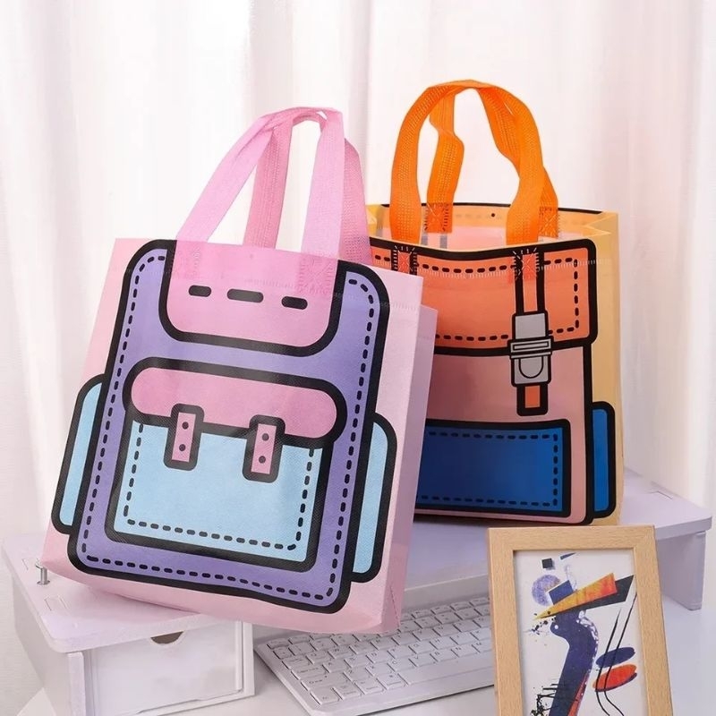 

Goodie bag tas spunbond ransel souvenir tas ulang tahun hampers non woven anti air tote bag