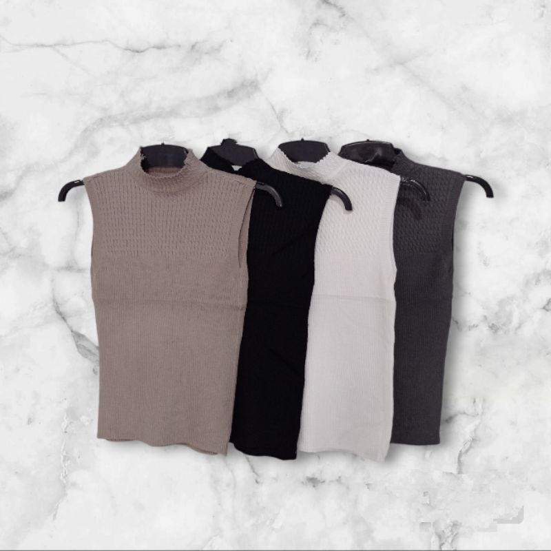 Manset tanpa lengan knit turtleneck