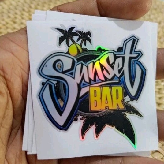 

sticker logo sunset bar pantai