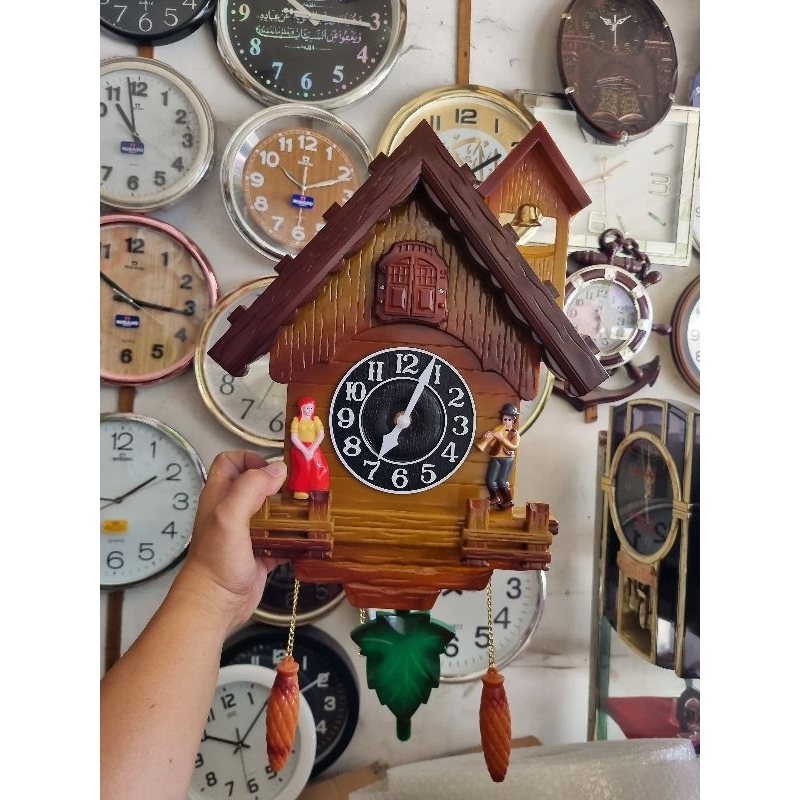 jam dinding kikuk perjam (burung keluar)esa mesin sweep halus