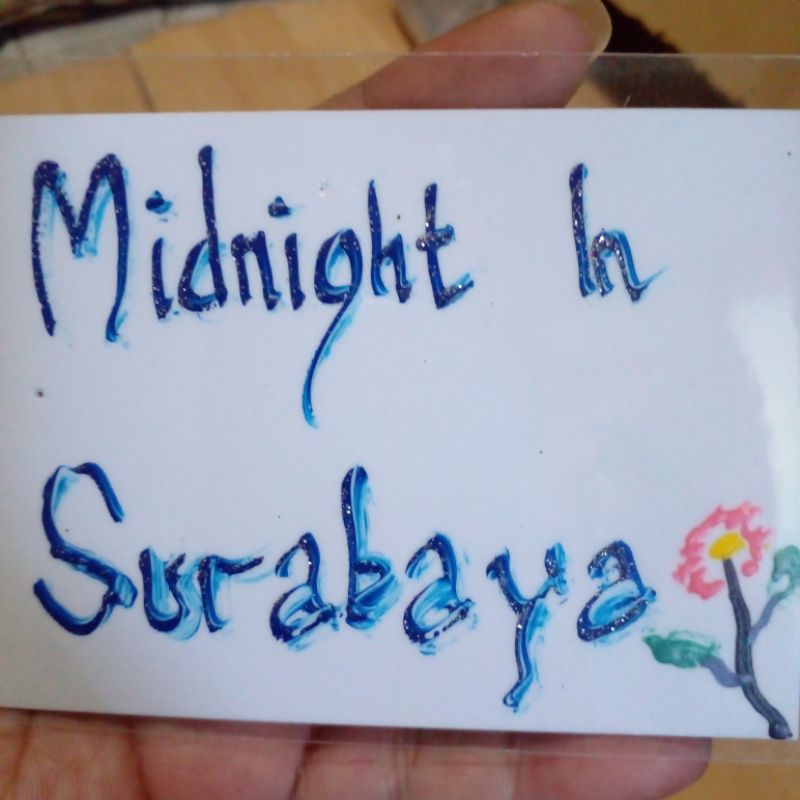 

British Sticker Timbul Glitter : Midnight in Surabaya (tulisan di sticker tampak berkilau/ kelap- kelip karena ditaburi bubuk glitter)
