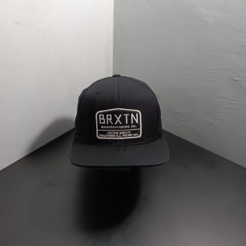 Topi cowok snapback caps BRIXTON warna hitam pekat original second brand official tag by BRIXTON mad