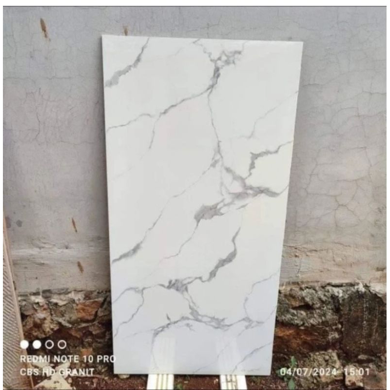 granit lantai 60x120 motif carara white