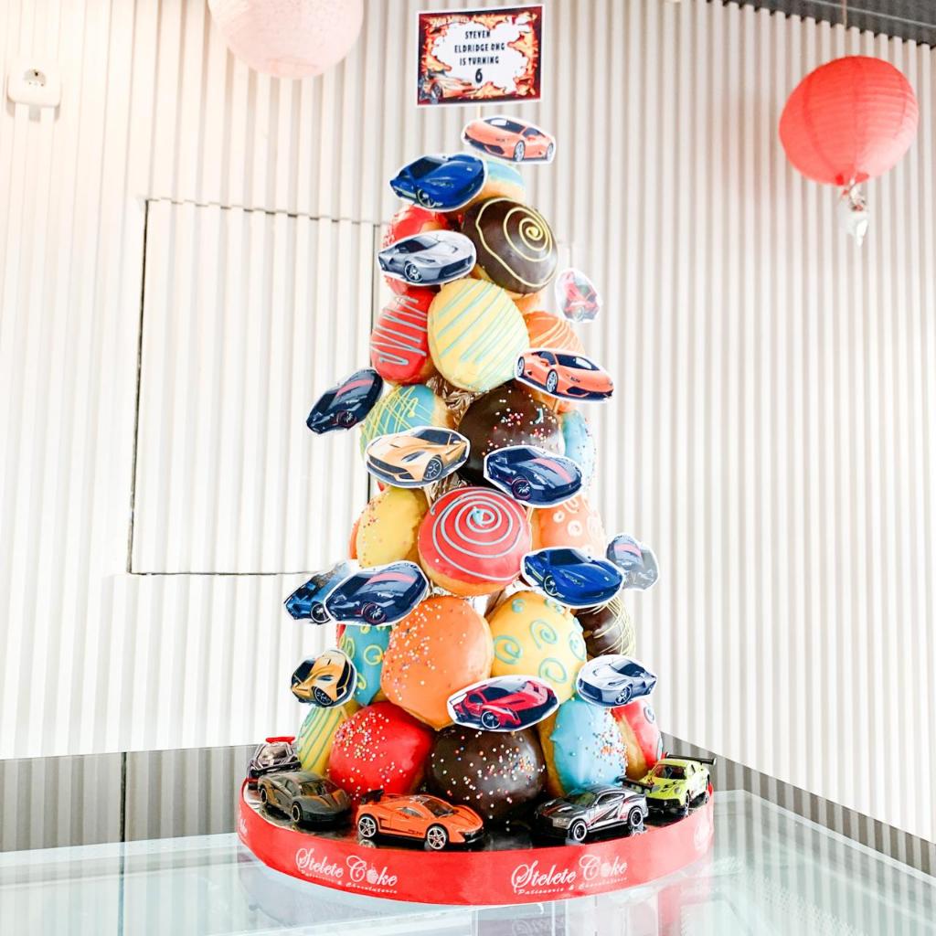 

Kue Ulang Tahun/Birthday Cake/Donat Tower Tema Mobil/Kue Birthday Jakarta/Donat Tower