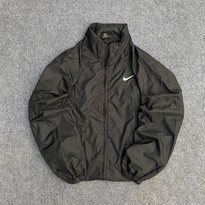 NIKE INTERNATIONAL WINDBREAKER