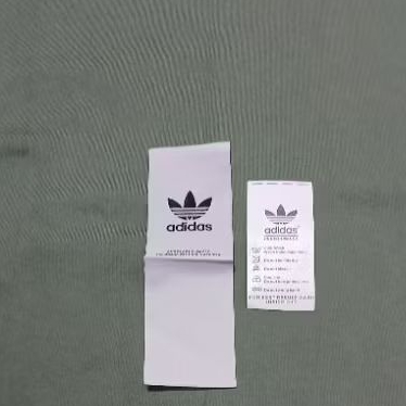 

ADIDAS WOVEN + WASING LABEL