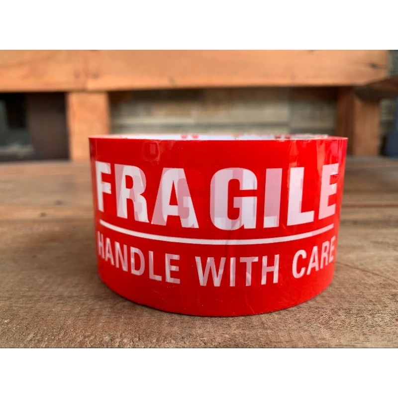 

Isolasi / Lakban Fragile Merah Harmony 48 mm x 72 yard