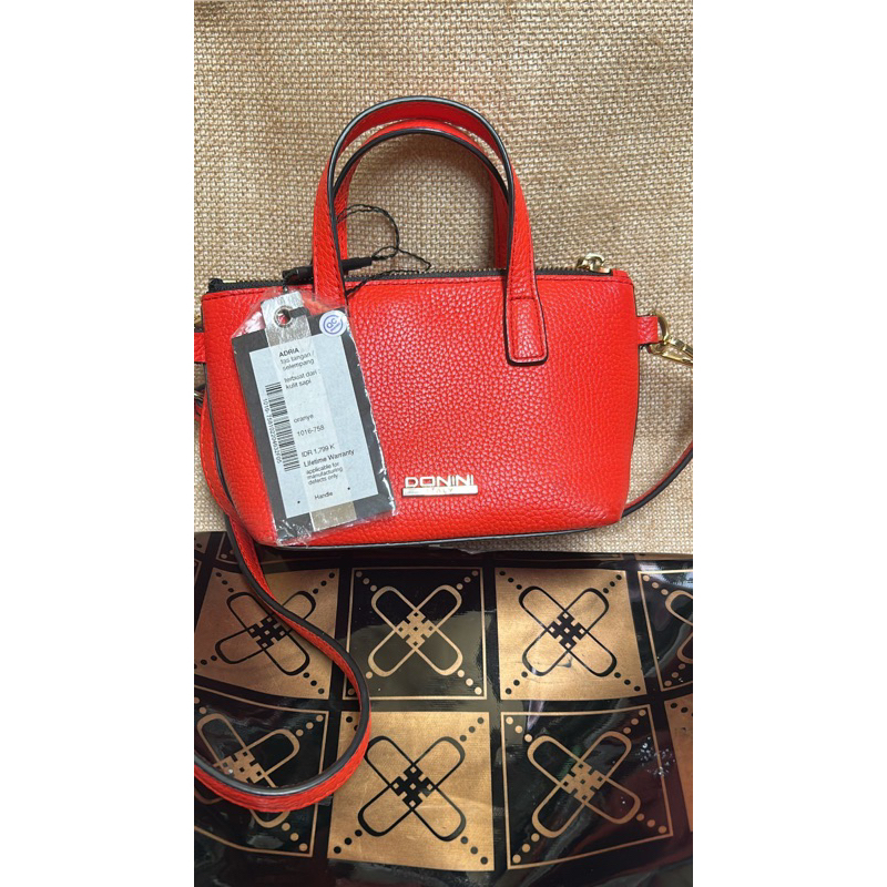 TAS ORI MEREK DONINI