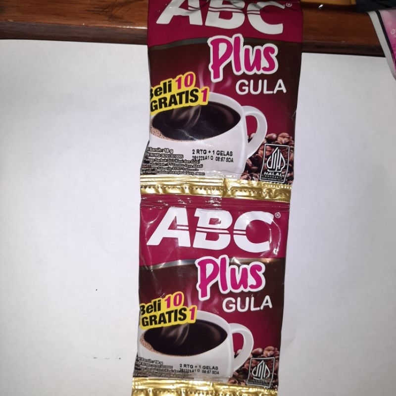 

Kopi ABC Plus gula 1 renceng isi 10 sachet