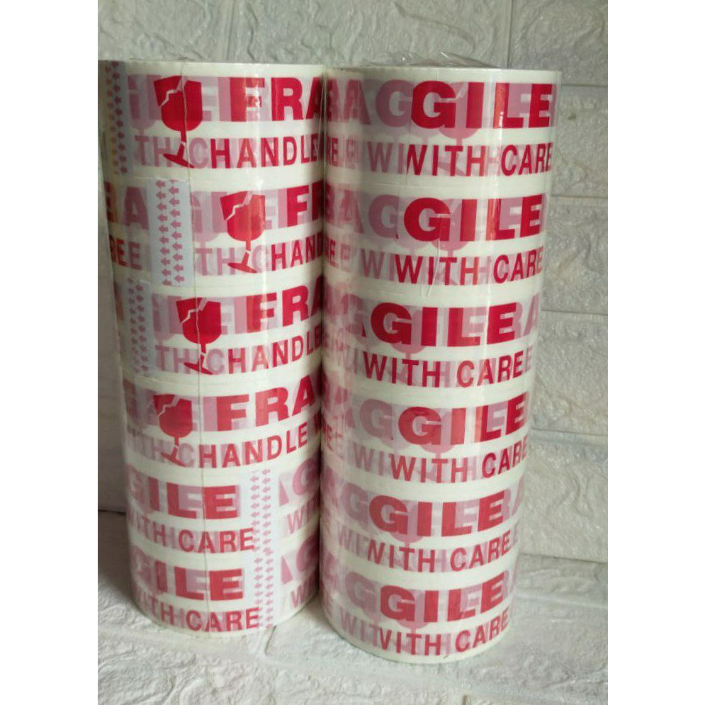 Lakban putih "fragile" berry tape