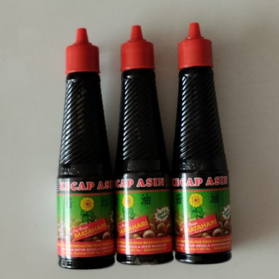 

KECAP ASIN Cap Bunga Matahari Kemasan Botol 135ml Kecap Asin Halal