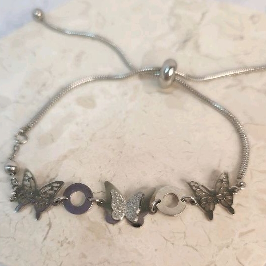 Gelang serut silver titanium kupu