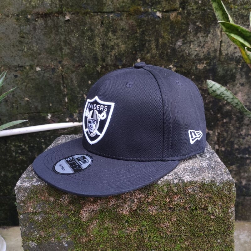 topi snapback raiders new era cap