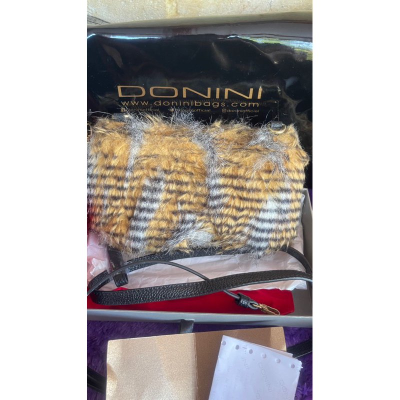 dompet donini like new