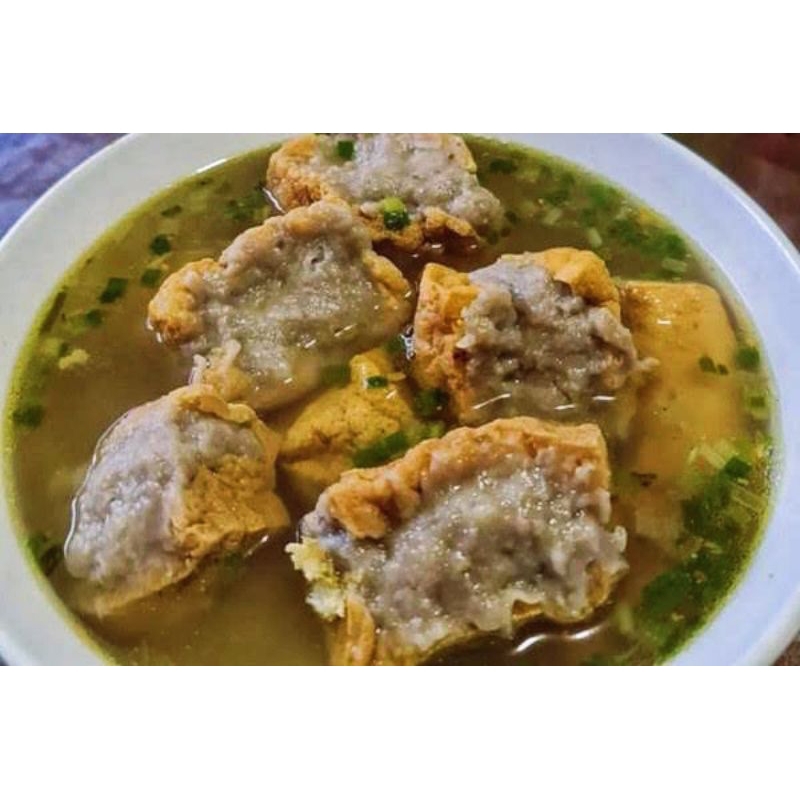 

Klenger Tahu kuah 100% daging sapi mix ayam asli sudah komplit dengan bumbu isian baksonya full sedalam tahunya gurih enak empuk kenyal bertekstur