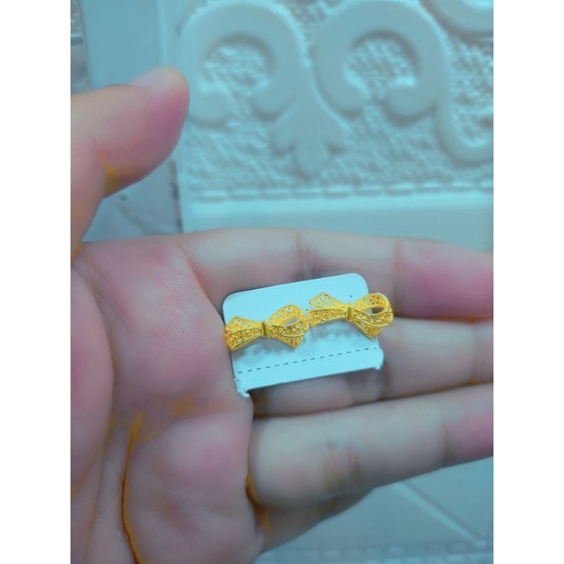 anting pita tusuk
