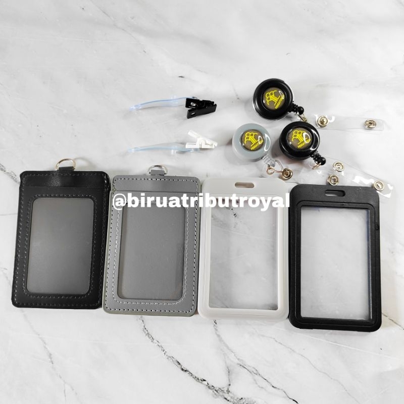 

NAME TAG 2 SLOT SEMI KULIT KUMHAM / ID CARD HOLDER VERTICAL 2 SISI FRAME KUMHAM - KEMENKUMHAM